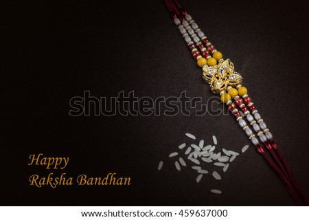 Raakhi - A traditional Indian wrist band which is a symbol of love between Brothers and Sisters. Raksha Bandhan Greeting.