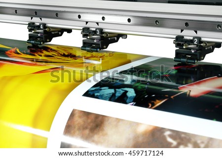 Large printer format inkjet working  Royalty-Free Stock Photo #459717124