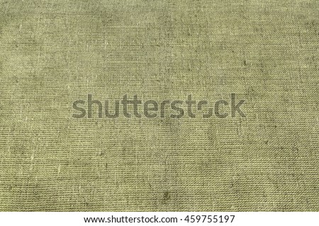 Military Army Coarse Canvas Fabric Cloth Tarp Tent Burlap Sack. Rough Grunge Texture Background Or Wallpaper Close Up. Toned Horizontal Image