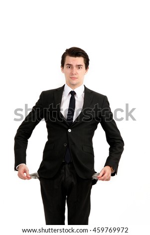 Broke businessman with empty pockets. Closeup side view profile portrait of upset young man, worker, employee, business man hands in pockets, open mouth yelling isolated on white background