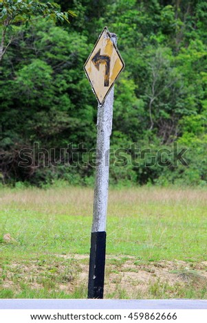 old traffic sign turn left at thailand