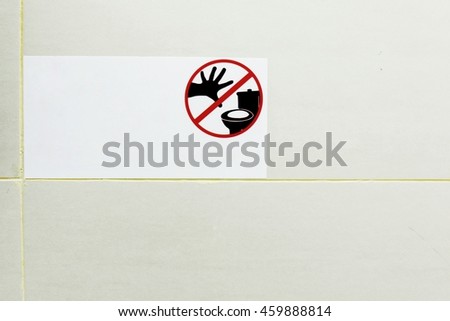 Bathroom Signs on wall for copy Text Message (Do not throw away tissues down the toilet)