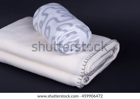 Wool blankets on dark background