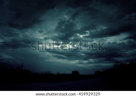 Background of dark sky before a thunder-storm  Royalty-Free Stock Photo #459929329