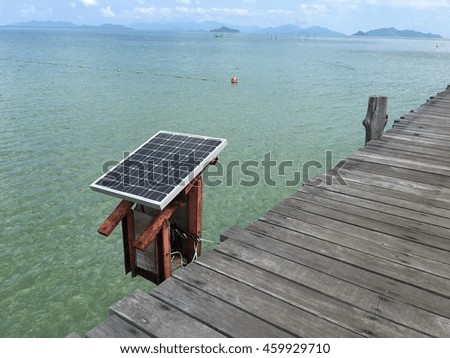 Solar panel and the sea Royalty-Free Stock Photo #459929710