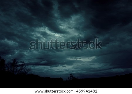 Background of dark sky before a thunder-storm  Royalty-Free Stock Photo #459941482