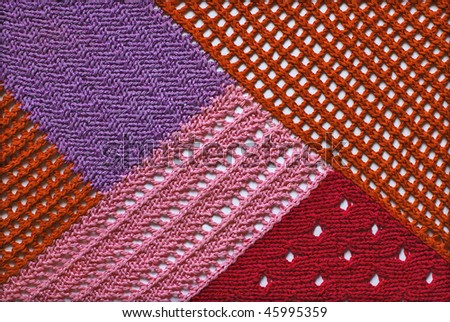 Abstract colorful texture knitted by spokes.Knitted background.Patchwork style