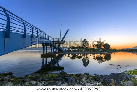 bridge reflection at sunrise