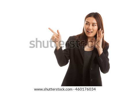 Excited Asian business woman point to blank space  isolated on white background.