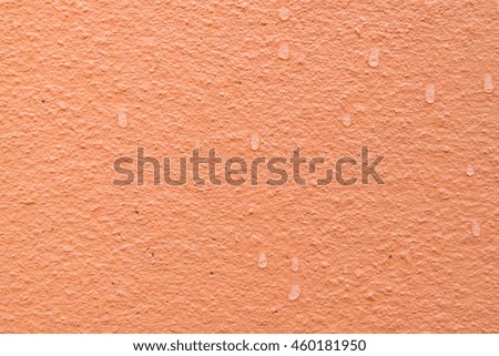 Cement painted orange texture,background,pattern wall.