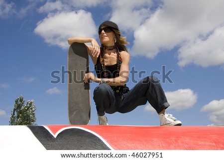 Young woman with her skate