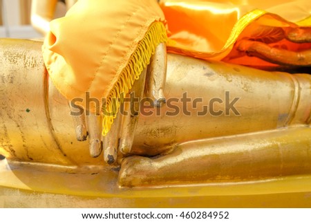 Finger and Rope of golden Buddha statue in Thailand