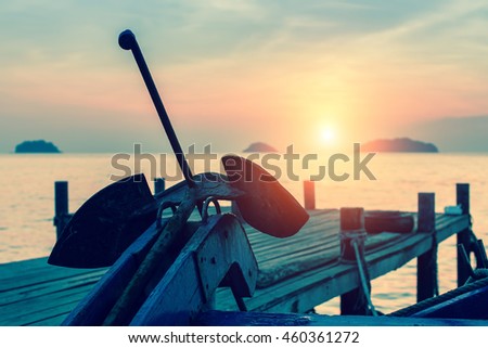 Thai fishing boats anchor at the stunning sunset.