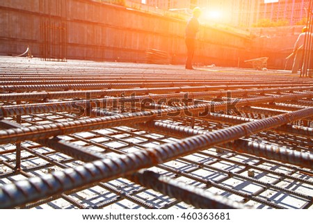 worker in the construction site making reinforcement metal framework for concrete pouring
 Royalty-Free Stock Photo #460363681
