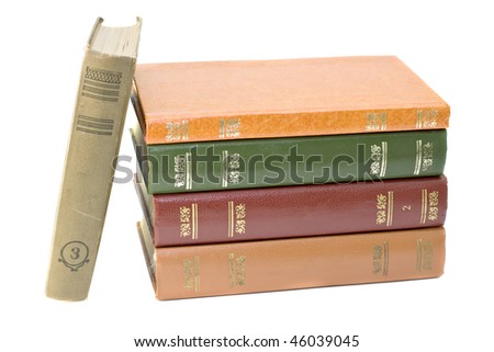 pile of old books isolated on a white background