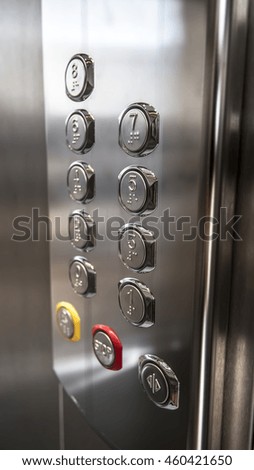 Metallic round elevator buttons