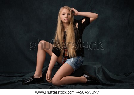 Beautiful blonde girl in jean shorts