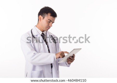 Doctor holding blank tablet pc in hospital.