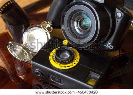 retro camera and pocket watch