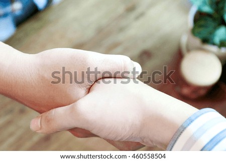  businessman hand hold together,Business handshake and business people. Business handshake for closing the deal after singing the lucrative contract between companies.Trust business partner
