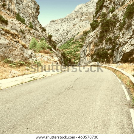 Winding Paved Road in the Cantabrian Mountain, Spain, Vintage Style Toned Picture