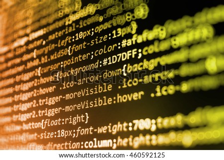 Website programming code. Software development. Writing programming code on laptop. Developer working on software codes in office. Programmer occupation.  Software background. 
