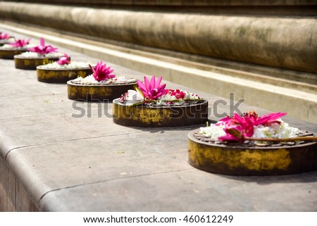 Flower Offerings on the Stone Platforms of the Cloister Walk in the Mahabodhi Temple Complex, Bodh Gaya
