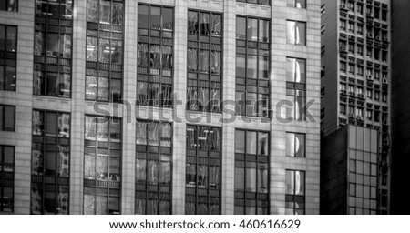 windows of business building with B&W color
