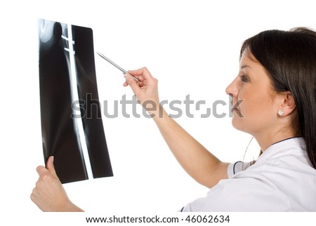 Female doctor checking xray image