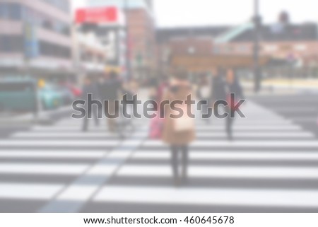 Blurred abstract background of zebra crossing in city