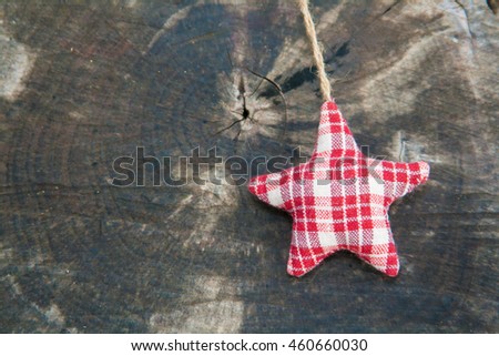 Christmas decoration star on wooden background