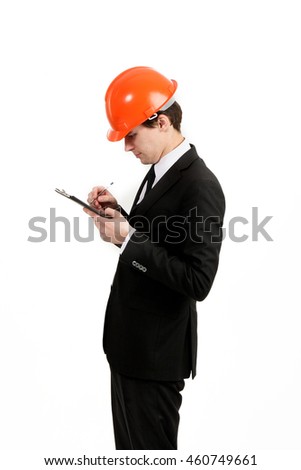 Handsome young builder and architect is working on a new project isolated on white background.