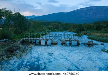 Celina River Croatia Europe, Beautiful nature and landscape photo of warm summer evening at dusk. Lovely outdoors image of trees, forest, stones and water. Nice, calm and peaceful picture.