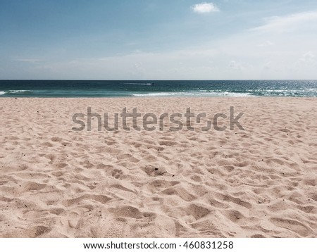 Beach with blue sky and white cloud. Travel concept. Retro color style.