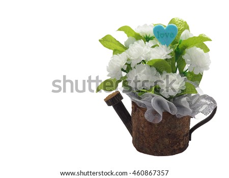 Artificial flowers, White jasmine on the wooden vase with hart love sign, For Mother day in Thailand.