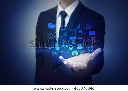 Close up of businessman holding social media icon 