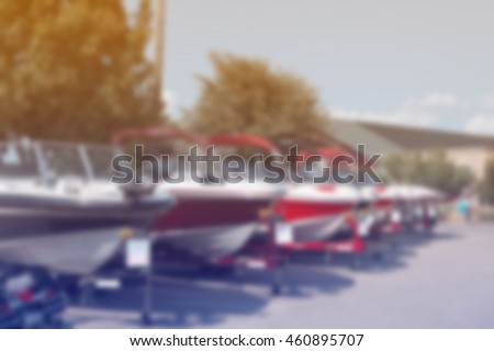 blurred picture of speed boats for background, filtered color tone