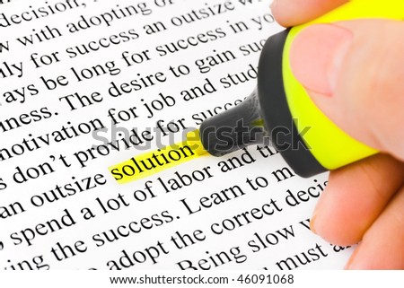 Hand with highlighter and word solution - concept business background