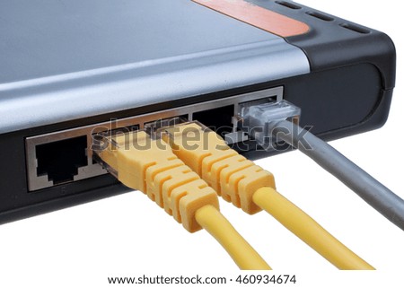 Network hub with plugged ethernet cables LAN isolated on white background with clipping path