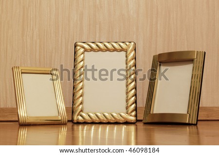 photo frames on wooden floor
