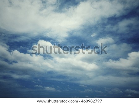 Blue sky and clouds background texture