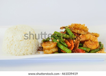 Spicy stir fried shrimp with red curry paste and Yard Long bean,