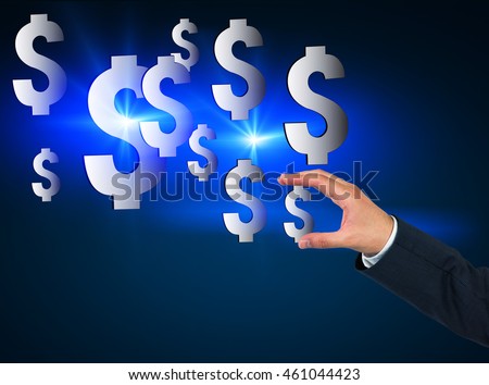 Man's hand holding one of dollar signs. Concept of earning money and developing your business. Importance of good investments and start capital. Toned image