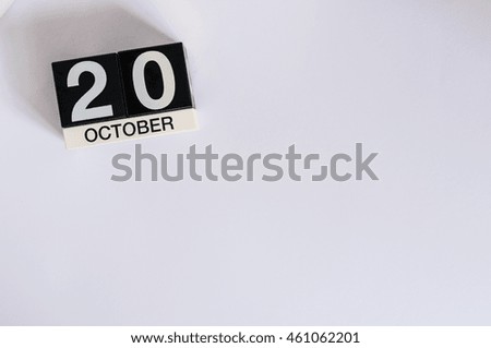 October 20th. Day 20 of month, wooden color calendar on white background. Autumn time. Empty space for text