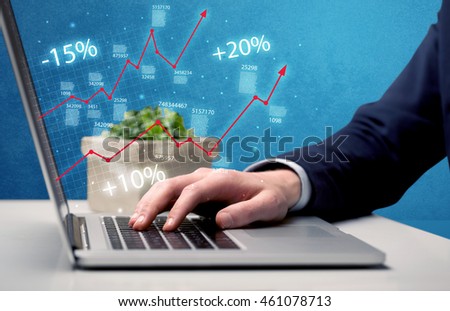 An elegant businessman working on graph statistics calculation using a laptop with clear blue background concept