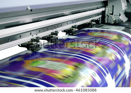 Large printer format inkjet working  Royalty-Free Stock Photo #461085088