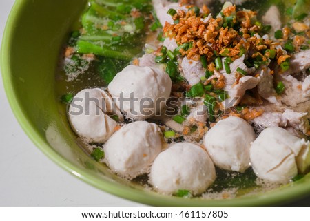 This is Kuy teav. It is a noodle soup consisting of rice noodles with beef stock and toppings.