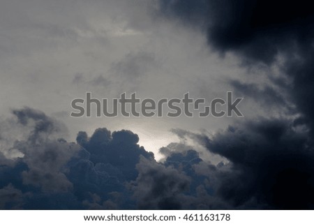 Black clouds with light of the sun.