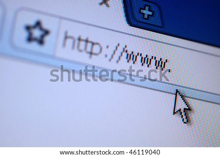 Close-up macro of web browsing and entering a url