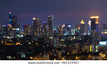 Abstract blurred city office building lights at night